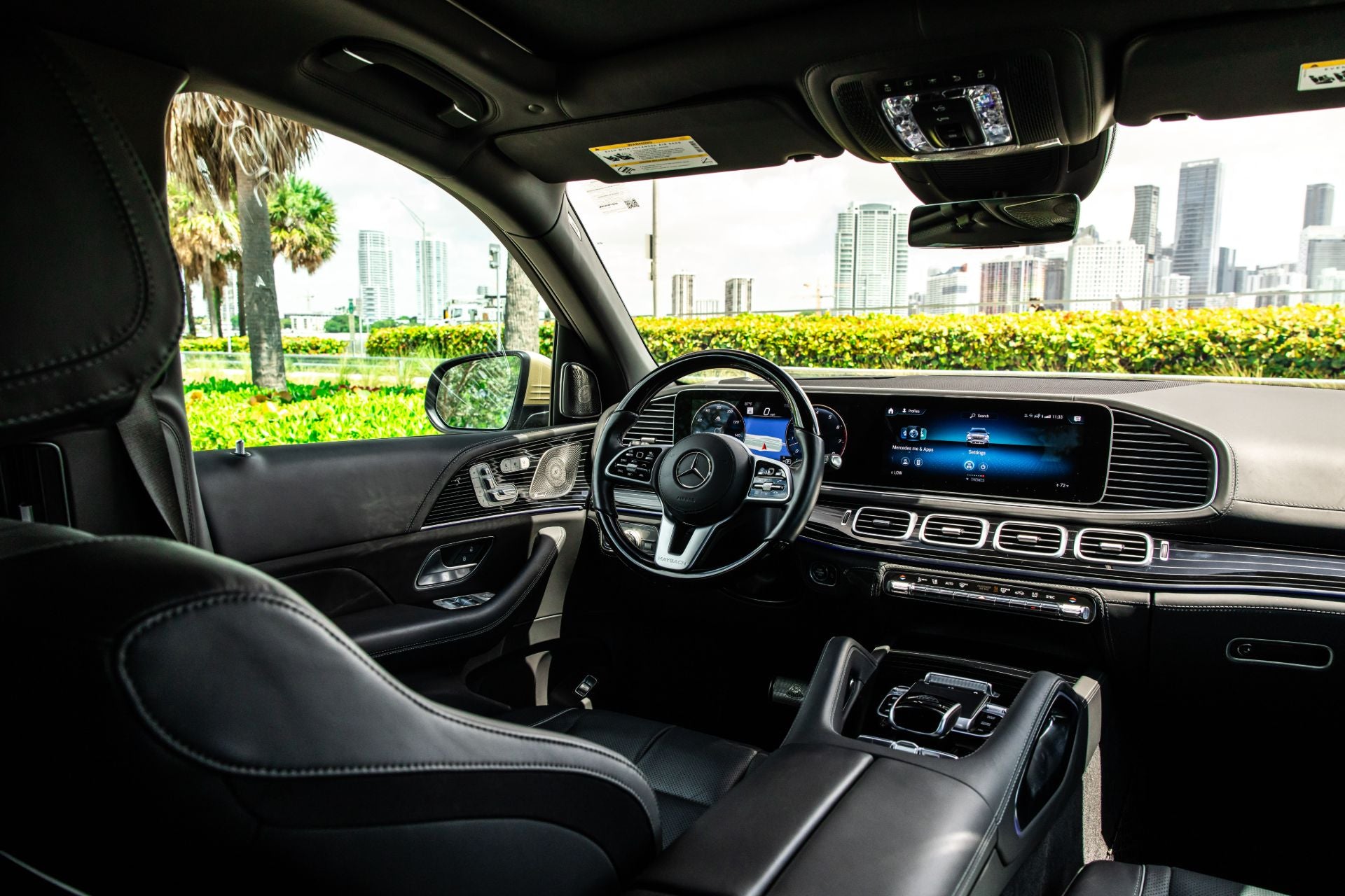 Mercedes Maybach GLS600 interior with dashboard, steering wheel, and front seats in a vehicle.