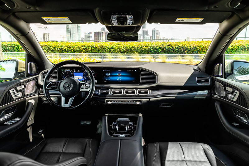 Mercedes Maybach GLS600 interior with dashboard and steering wheel in a vehicle.